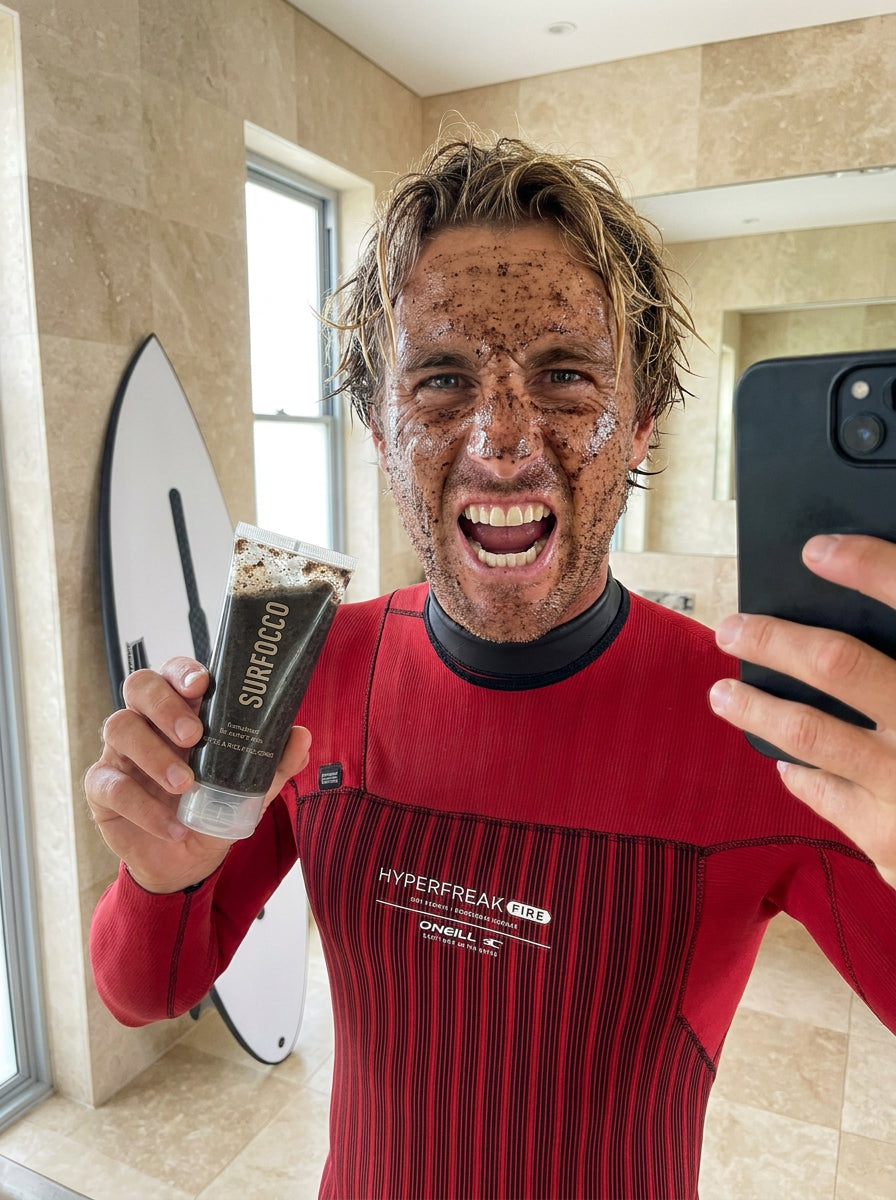 Surfer holding Surfocco face scrub after surf session exfoliating face scrub for surfers